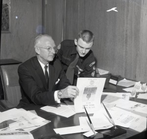 Russell F. Bonesteele (left) and unidentified Boy Scout reading the 1959-1960 City of Salem Budget. Al Jones Collection, WHC 2006.064.0601.006.