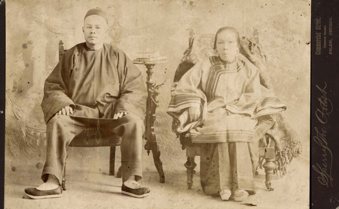 Seated portrait of man and woman.